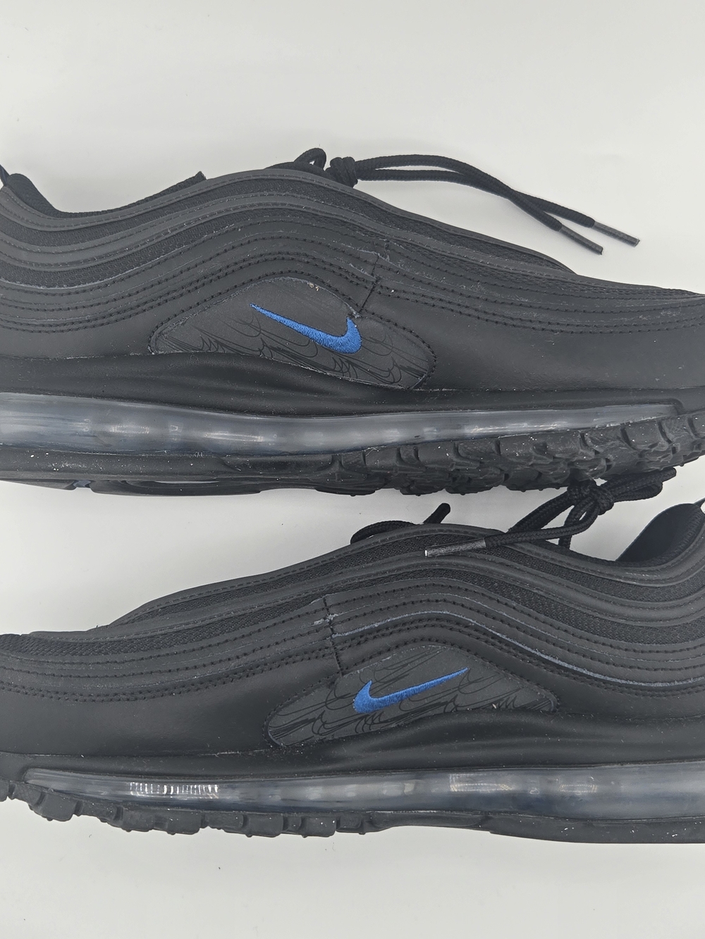 Nike Men’s Black Sneakers with Blue Swoosh